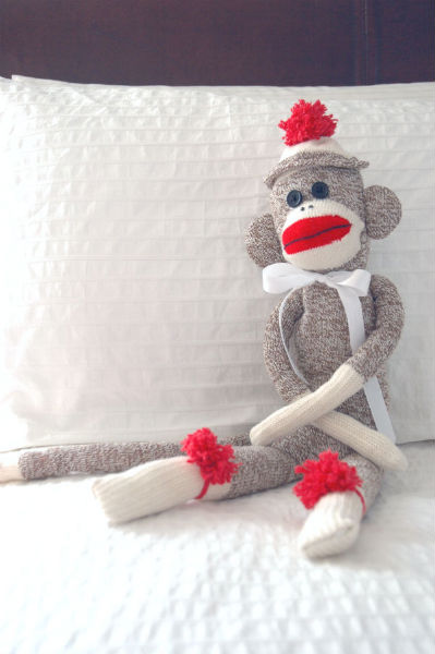 sock-monkey-arms-crossed